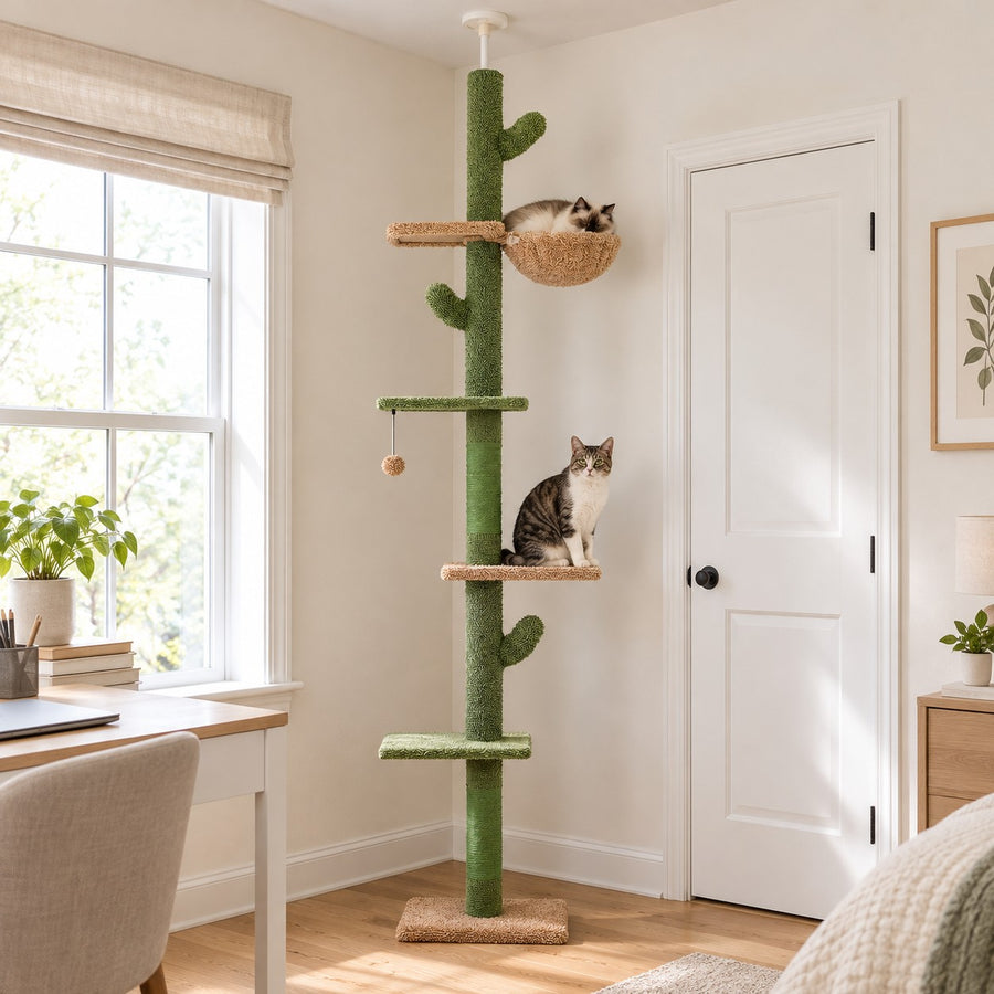 Floor-to-ceiling cactus cat tree with green and tan platforms in a room