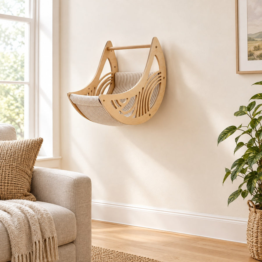 Moon Hammock: crescent-shaped pine cat hammock mounted on a living room wall