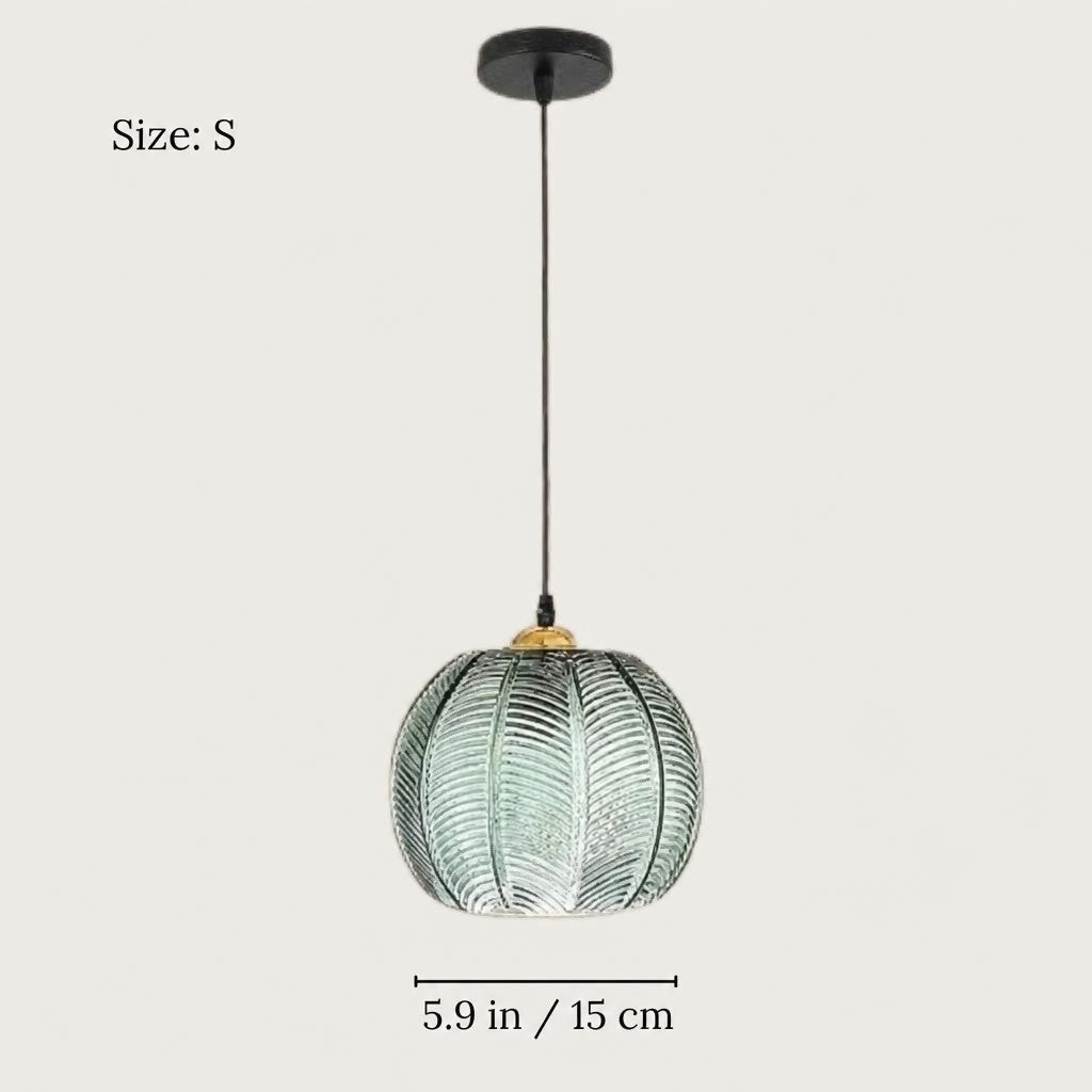 Suspension jungle en verre vert : boule nordique