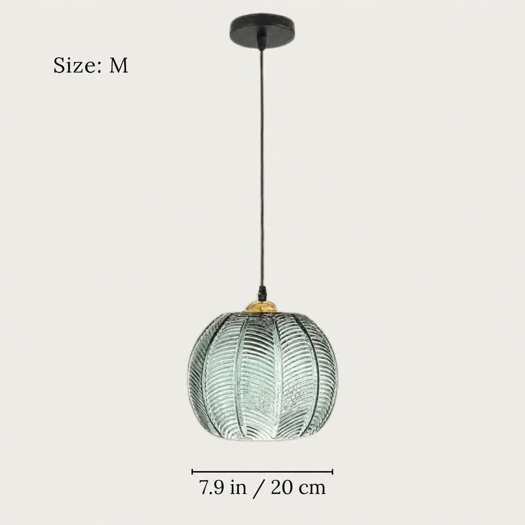 Suspension jungle en verre vert : boule nordique
