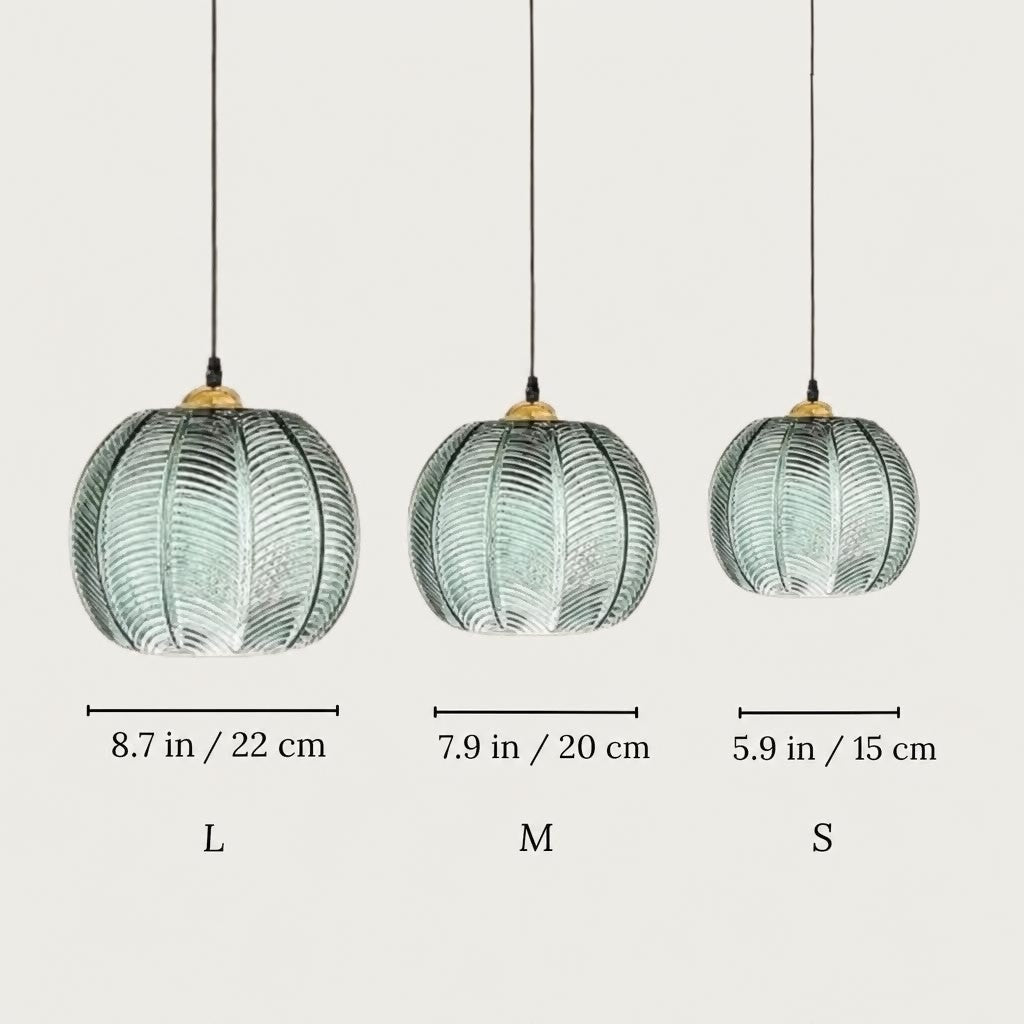 Suspension jungle en verre vert : boule nordique