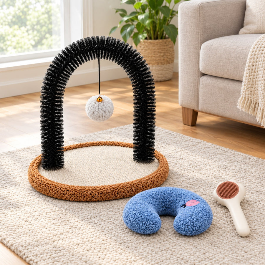 Cat self groomer arch with sisal base, paw brush and blue U pillow in a living room