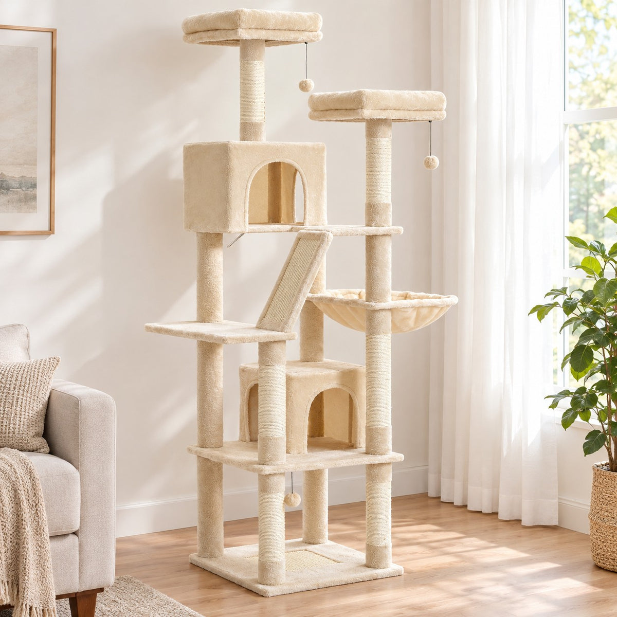 Beige cat tree tower with two condos, hammock and sisal ramp in a living room