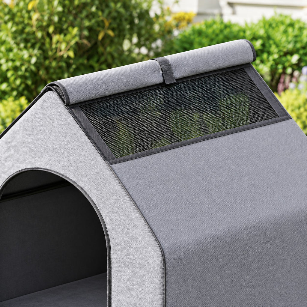 Roll-up roof window of the dog house opened on its mesh panel