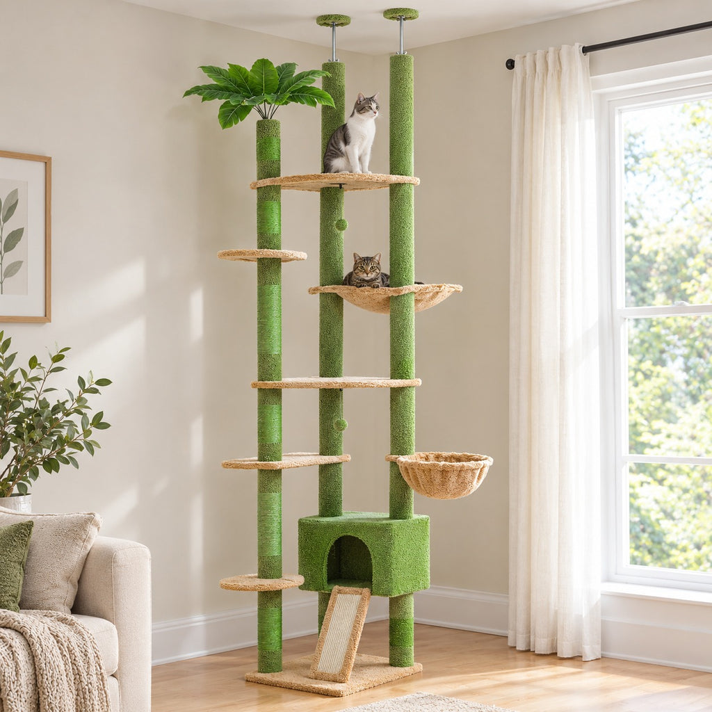 Cat lying in the basket hammock of a floor to ceiling palm-leaf cat tree, another cat on a high platform