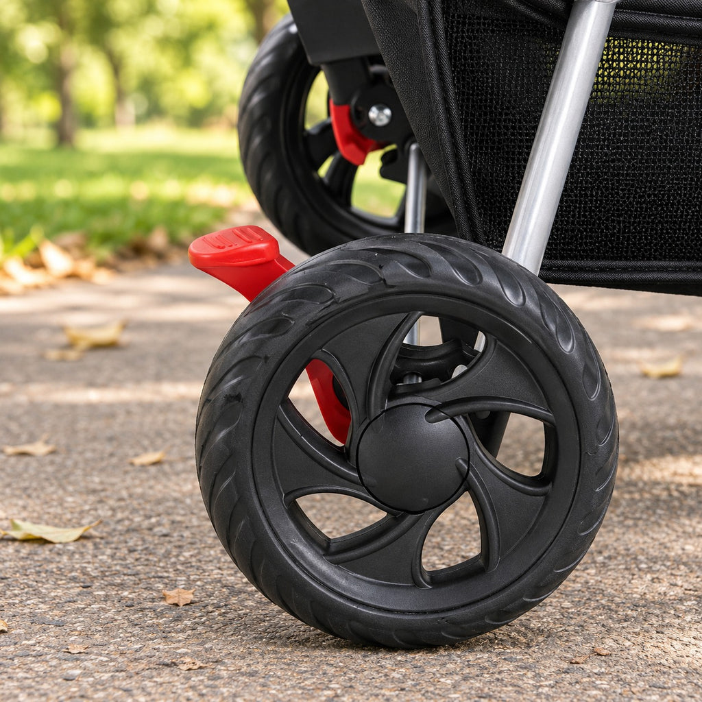 Rear wheel and red brake pedal of the 3-wheel pet stroller