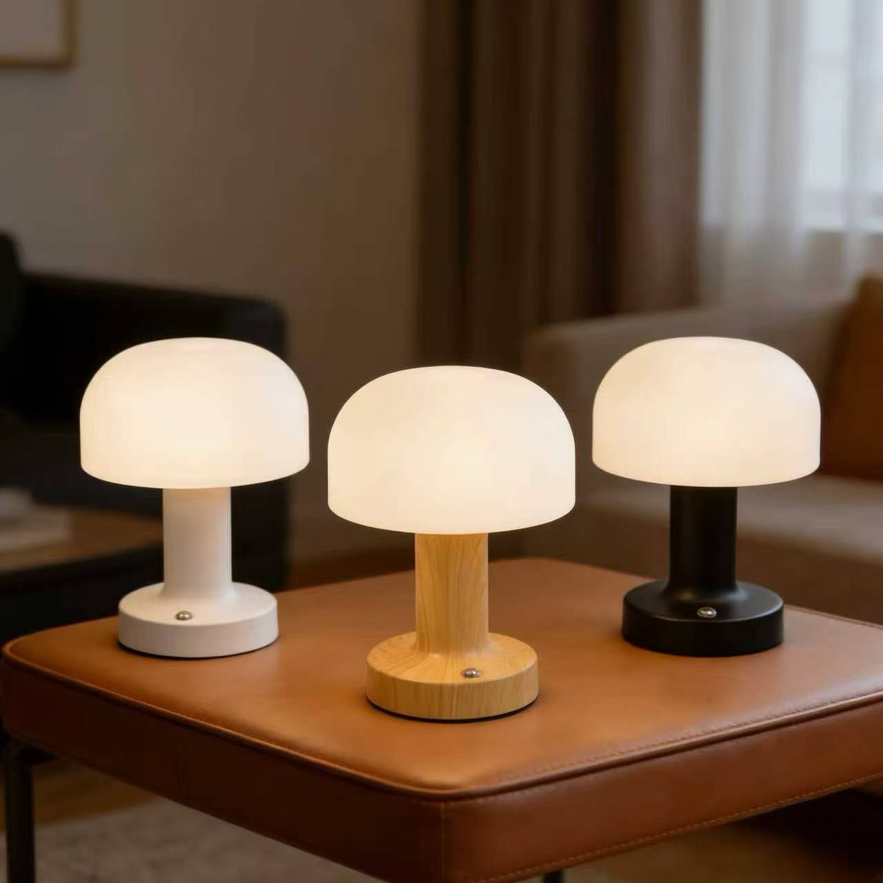Mushroom lamp in white, wood and black finishes on a leather bench Image